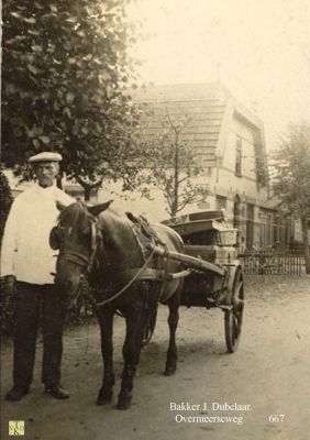 0667 Bakker met paarden broodkar.
